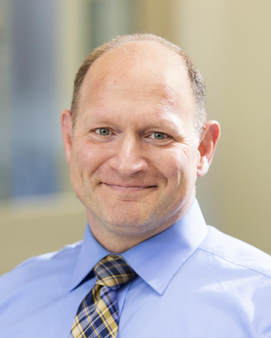 Headshot of Douglas Benson